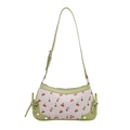 Chic white shoulder bag with cherry print and green leather trim on white background - Green