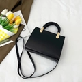 Chic black square handbag with round handles and gold hardware on a white background - No Pendant / Black