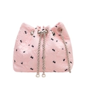 Pink quilted bucket bag with black bows, silver chain strap and pearl charms - Pink