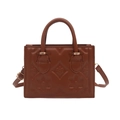 Women's vintage caramel embossed leather handbag with floral pattern and adjustable strap - Brown
