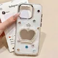 Sparkly iPhone case featuring a heart-shaped pearl mirror and colorful metal stars - Electroplated Frame-White Glitter Epoxy-Starfish Crown Mirror / iPhone 7/8/SE 2020