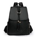 Women's black faux leather backpack featuring trendy dual tassels and gold-tone hardware - Black