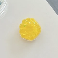Primer plano del soporte para móvil de resina con forma de concha amarilla y purpurina - Amarillo