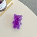 Detail of purple bear-shaped phone grip with gold foil inlay on a minimalist desk - Dark Purple (Gold Foil Transparent Bear)