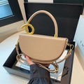 Chic beige saddle handbag with golden round handle and adjustable shoulder strap - Khaki