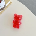 Macro detail of red translucent bear phone grip with sparkling gold foil flakes - Red (Gold Foil Transparent Bear)