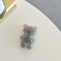 Macro detail of bear-shaped phone grip in translucent grey resin with gold foil flakes - Gray (Gold Foil Transparent Bear)