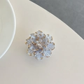 Macro detail of 3D camellia flower phone grip with gold edges and crystal core - Transparent Stand - Shell Flower - Blue Gold