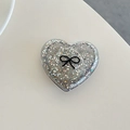 Dettaglio del supporto per telefono a cuore argento con glitter e design a fiocco - Cuore 3D Pois Glitter Fiocco Nero / Nero