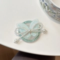 Macro detail of mint green embroidered butterfly phone grip with white pearl tassels - Magnetic Pearl Embroidery Butterfly-Light Green