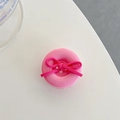 Detailed top view of pink button phone grip with vibrant fuchsia velvet bow tie detail - Rose Red Bow Button