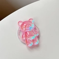 Makroaufnahme von 3D-Bären-Handyhalterung mit glitzerndem Finish und Pink-Effekt - Rosa