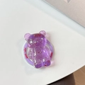 Close-up of purple resin bear phone grip with gold flakes and Good Luck text detail - Light Purple