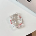Support de téléphone en forme d'ours avec feuilles d'or et texte Good Luck sur bureau blanc - Blanc