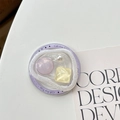 Detail of magnetic phone grip featuring gems and pearl with Gift For You text - Retro Pink Series - Yellow Square Purple Center