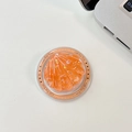 Detalle de un soporte de móvil de concha naranja con lentejuelas y diseño Gift For You - Estilo de Fragmento de Concha Magnética Brillante / Naranja