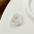 Détail du support de téléphone goutte d'eau avec serpents dorés et résine transparente - Perles d'Argent Doubles Serpents - Or