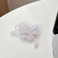 Detailed embroidery of purple butterfly phone grip with white pearls and iridescent threads - Embroidered / Purple