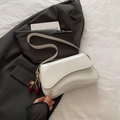 Minimalist white patent leather crossbody bag with cherry charm and asymmetrical flap - White with Pendant