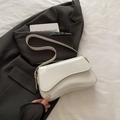 Chic white glossy patent leather shoulder bag with sleek curved flap and gold buckle - White Without Pendant