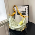 Light green pleated dumpling bag with yellow ruched shoulder strap and flower charm - With Pendant / Green