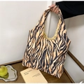 Large capacity canvas tote bag with bold orange and black tiger print for women - Leopard Print