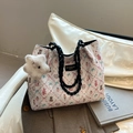 White tote bag with cartoon prints, black rope handles, and star plush charm detail - With Pendant / Black