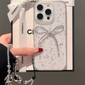 Klare iPhone Hülle mit silbernem Glitzer und 3D-Schleifen-Dekor für 16 Pro Max - Silberfolie Tropfkleber Schleife Mit Schwarz C Silber Herz Kette / iPhone 7/8/SE 2020