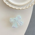 Close-up of iridescent bow phone socket with heart detail and pearly finish - Iridescent Blue