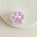 Gros plan du support téléphone patte de chat violette avec texture gelée sur plateau - Support Transparent-Patte de Chat Lumineuse / Violet