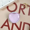 Detail of a purple translucent heart-shaped retractable phone grip with glossy resin finish - Purple Pink