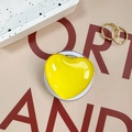Detail of yellow heart-shaped acrylic phone socket with transparent stand base - Yellow