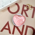 Close-up of pink heart-shaped phone grip with glossy texture on a decorative background - Textured Deep Pink