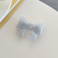 Detail of silver glitter bow-shaped phone griptok with transparent expandable stand - Large Bowknot Stand - Pearlized - Grey