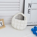 Detail of white quilted puff cloud bag with soft nylon padding and diamond texture - White