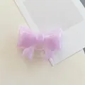 Detail of purple bow phone grip made of translucent resin with shimmering purple glitter - Large Bowknot Stand - Pearlized - Purple