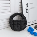 Chic black quilted cloud bag with a puff texture and minimalist top handle design - Black