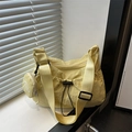 Light yellow nylon crossbody tote bag with round coin purse and wide shoulder strap - Yellow