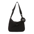 Black crescent tote bag with adjustable strap and detachable round coin purse charm - Black