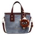 Blue denim bucket bag with brown leather trim and a cute furry monster charm - Blue (Without Charm)