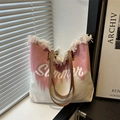 Borsa tote in tela sfumata rosa e bianco con manici in pelle e bordi con frange - Rosa