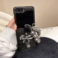 Detail of crocodile texture phone case with silver bow and pearl strap for Z Flip - Black / Samsung ZFlip3