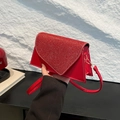 Red sequin flap crossbody bag with white stitching detail and slim shoulder strap - Red