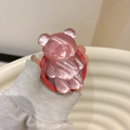 Detail of pink jelly bear phone socket with Good Luck engraving and cat-eye finish - Water Ripple Bear (Magnetic) / Red