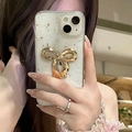 Funda iPhone con gran lazo dorado 3D y purpurina de lámina de plata sobre base crema - Lazo Dorado / iPhone 7/8/SE 2020