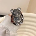 Detailed close-up of translucent bear phone grip with GOOD LUCK base and wave pattern - Water Ripple Bear (Magnetic) / Gray