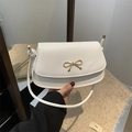 Elegant white bow shoulder bag in premium faux leather with golden metallic hardware - White