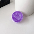 Macro view of purple glitter round phone socket holder with starfield texture effect - Dark Purple