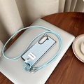 Detail of light blue leather phone case with long strap and goodgoodluck label - Textured Leather - Good Luck Mickey Mouse Ring - Round Leather Cord - Light Blue / Samsung ZFlip3