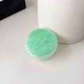Detail of mint green glitter phone grip holder with sparkling pearl shimmer effect - Cyan Green